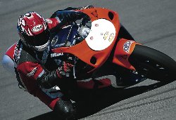 sportbike leaned over in a corner - photo by Kevin Wing